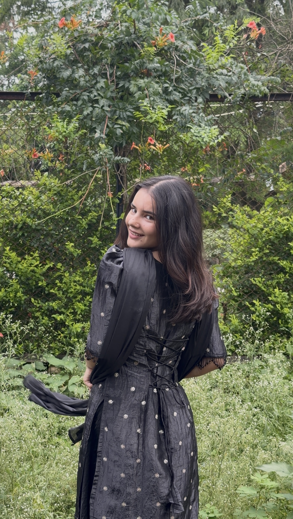 Black Embroidered Corset-Style Maxi Dress with Tie-Up Sleeves - Image 3